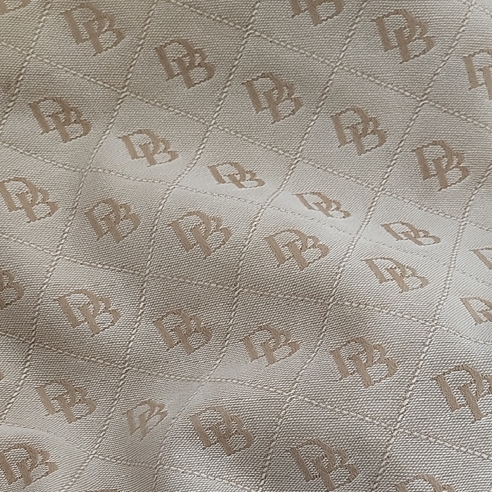 Dooney & Bourke Tan Monogram Designer Bag